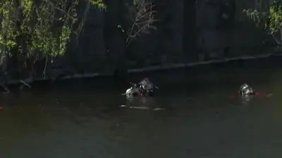 Body recovered from car in Lowell river
